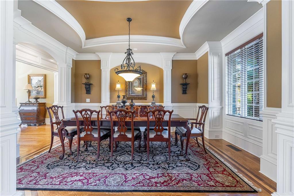 2145 Jones Phillips Road Dacula, GA 30019 - Photo 27 of 98 a view of a dining room with furniture window and wooden floor