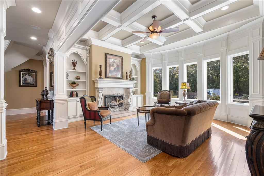 2145 Jones Phillips Road Dacula, GA 30019 - Photo 28 of 98 a living room with furniture and a fireplace