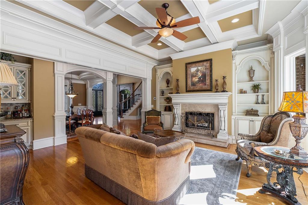 2145 Jones Phillips Road Dacula, GA 30019 - Photo 30 of 98 a living room with furniture and a fireplace