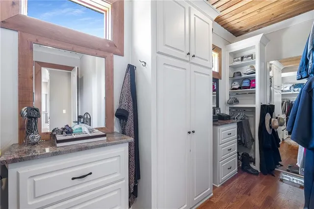 a view of a town with large trees