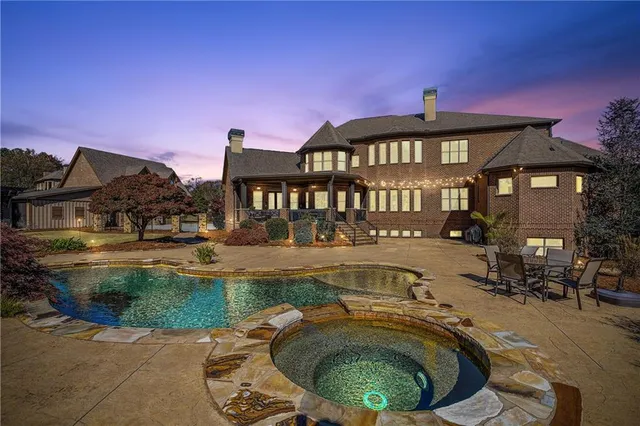 a large white kitchen with a large window