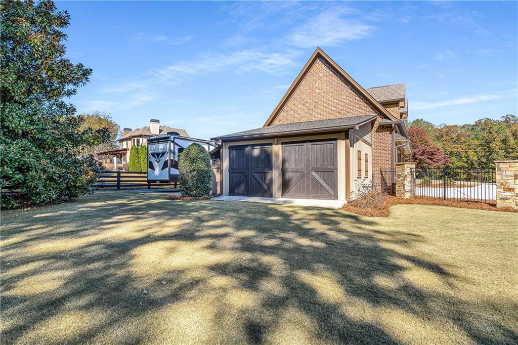 2145 Jones Phillips Road Dacula, GA 30019 - Photo 69 of 98 a view of a house with a yard