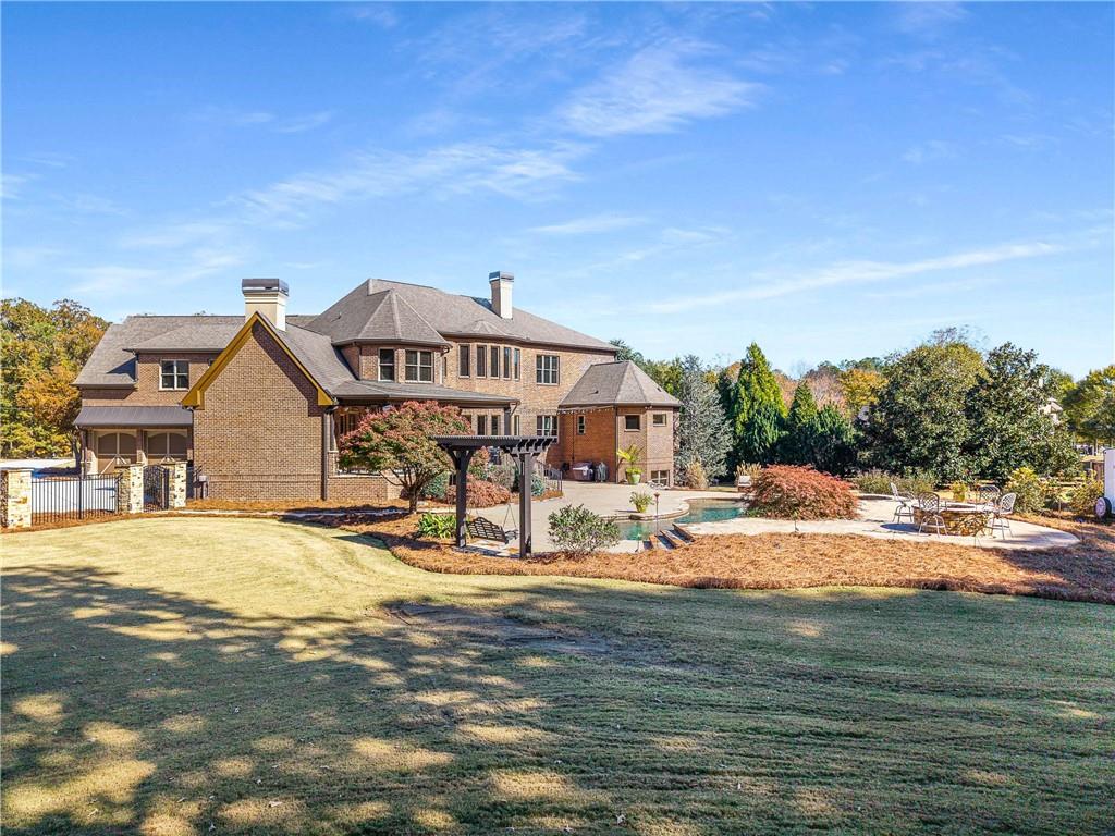 2145 Jones Phillips Road Dacula, GA 30019 - Photo 91 of 98 a view of a house with a ocean view