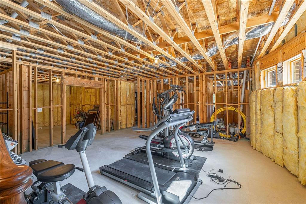 2145 Jones Phillips Road Dacula, GA 30019 - Photo 97 of 98 a view of a room with gym equipment