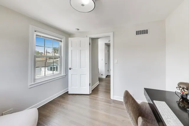 a view of a livingroom with furniture and window