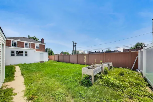 a picture of a bench in front of a window