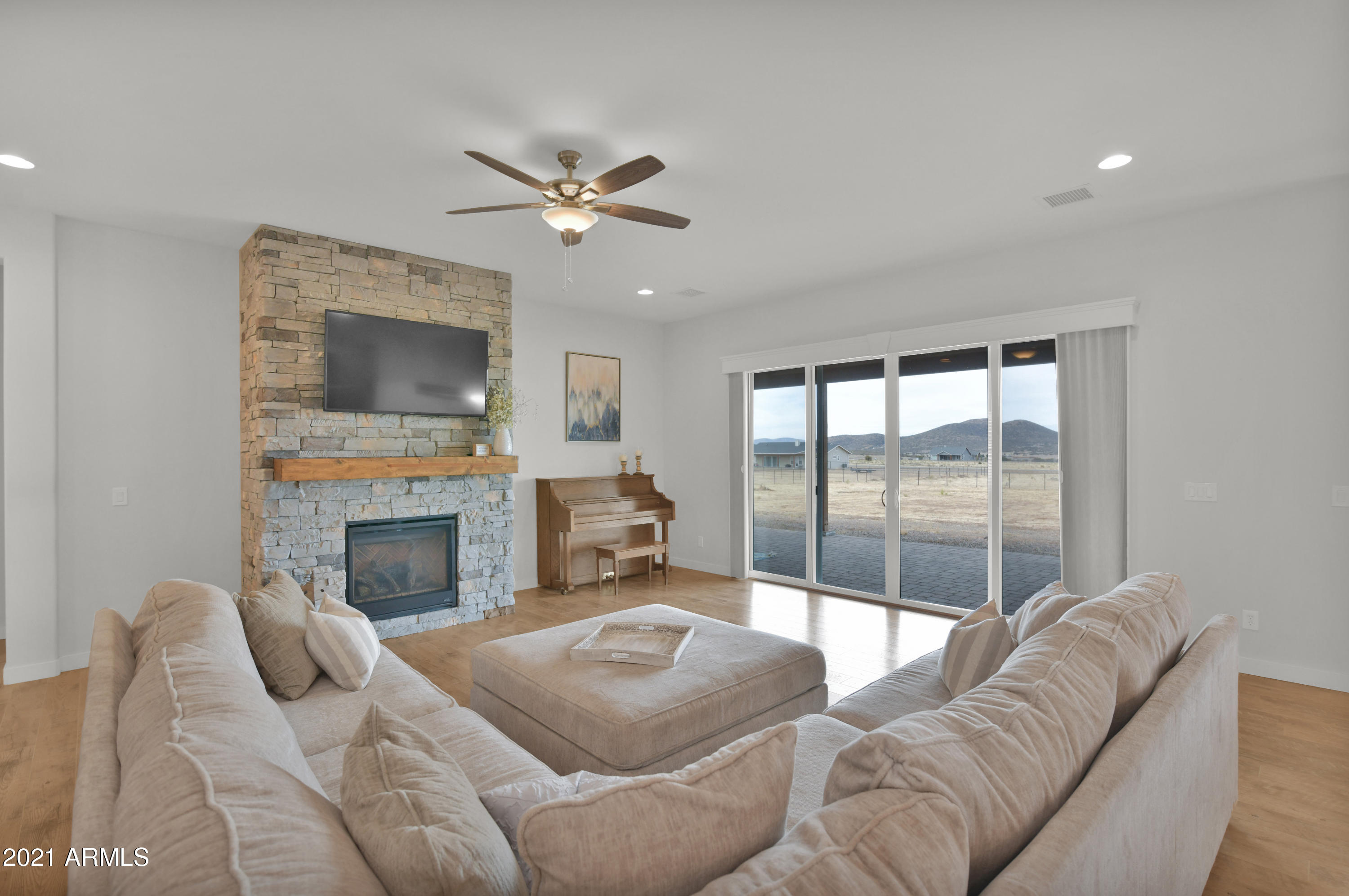 9600 North Manger Road Prescott, AZ 86305 - Photo 7 of 37 Gorgeous Stone Fireplace and Mantel