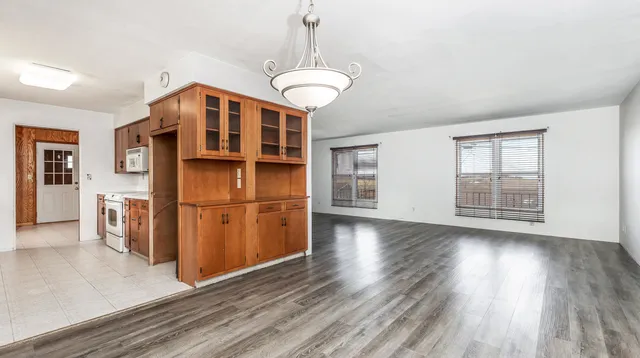 a view of a livingroom with wooden floor
