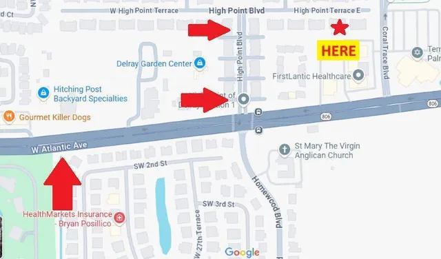 a view of a golf course with a house