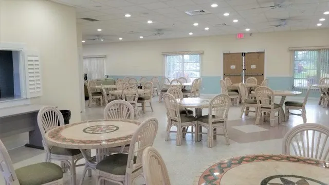 a kitchen with stainless steel appliances a refrigerator and a stove top oven