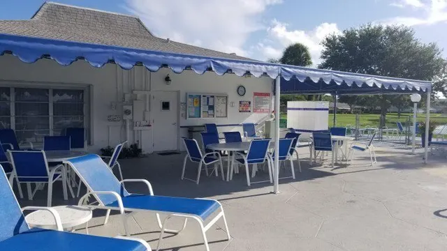 a view of a swimming pool with a patio