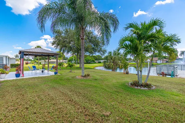 a view of a lake with a building in the background