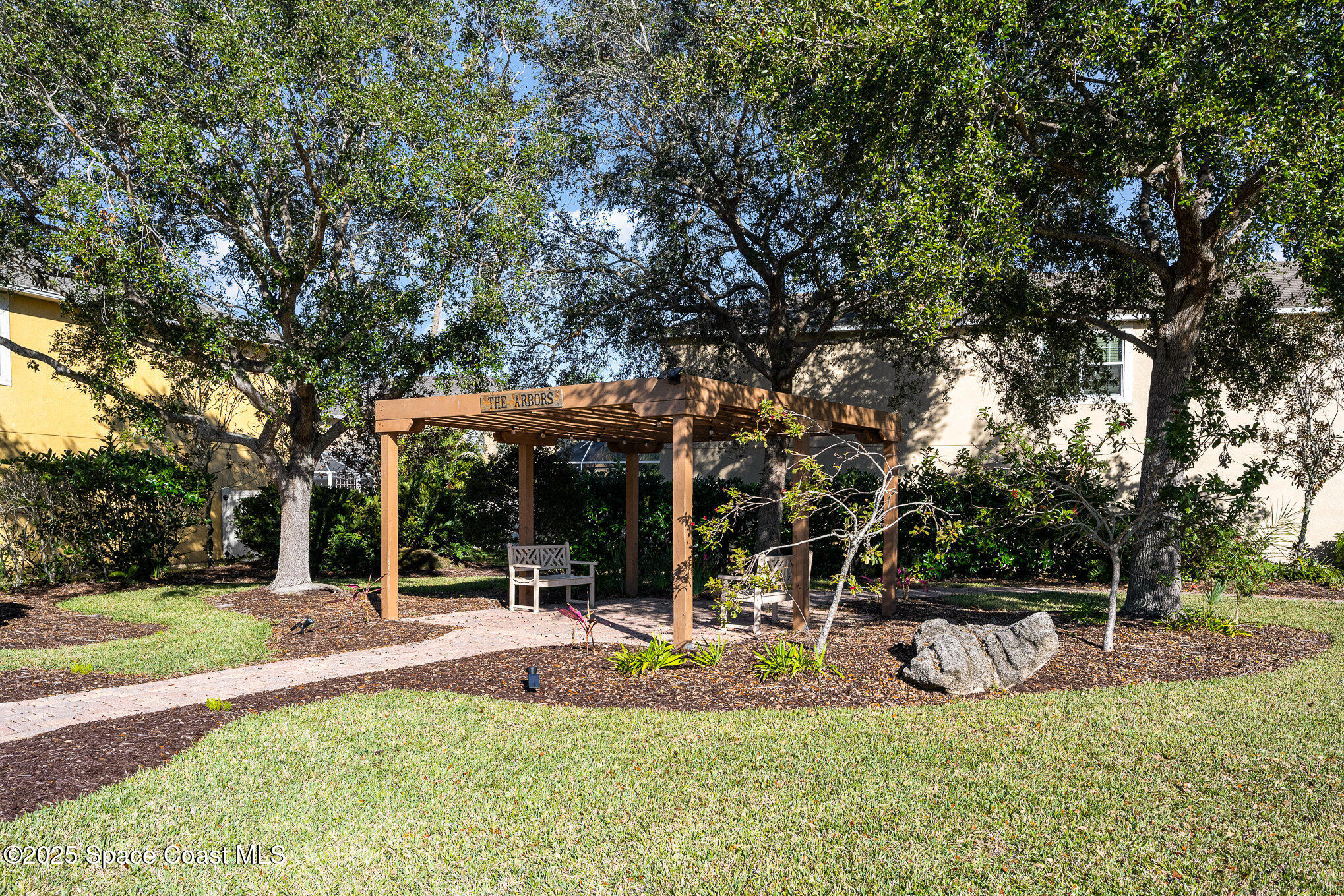 3226 Arden Circle Melbourne, FL 32934 - Photo 35 of 43 a view of a house with backyard and sitting area