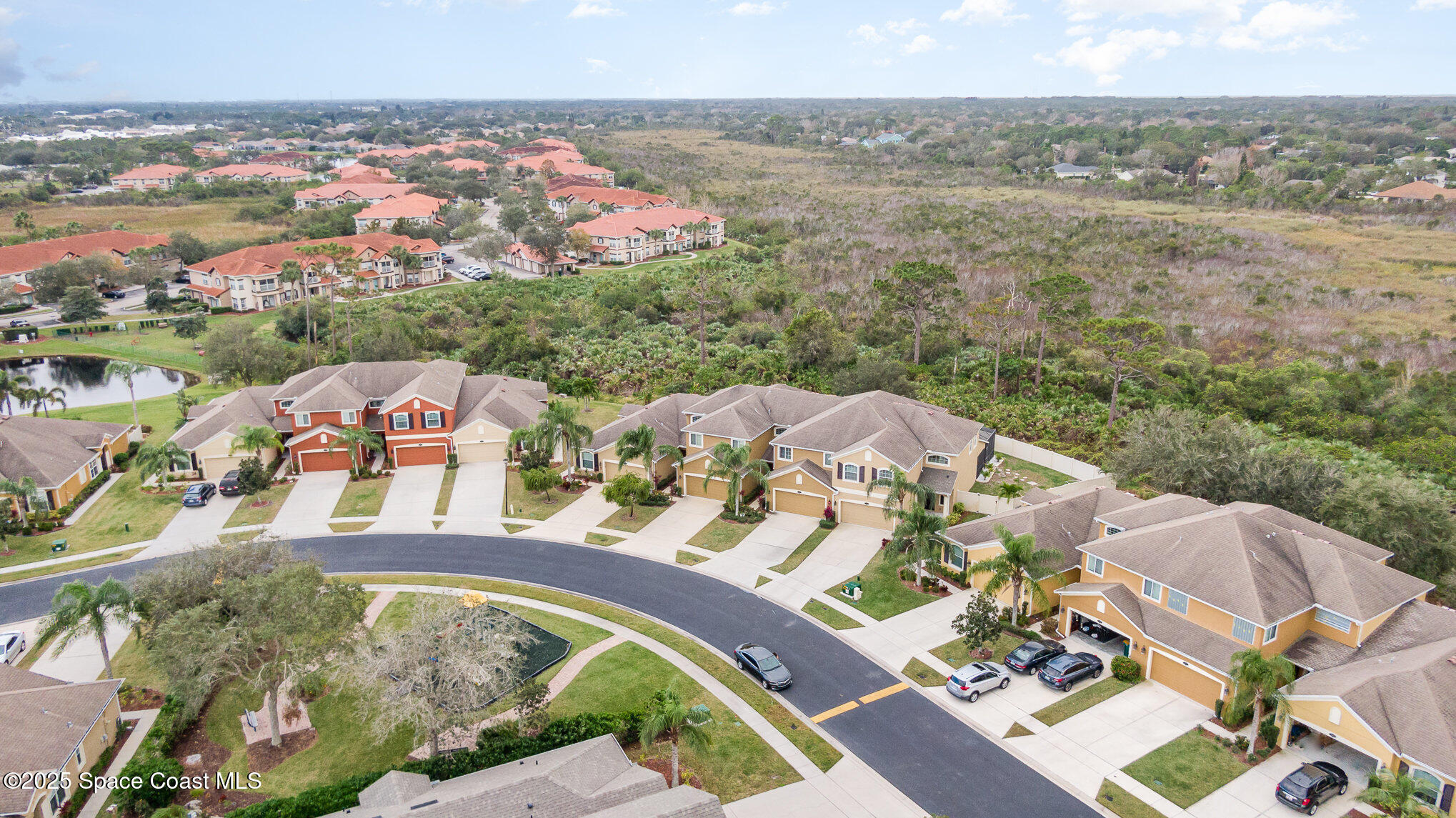 3226 Arden Circle Melbourne, FL 32934 - Photo 42 of 43 an aerial view of a house with yard