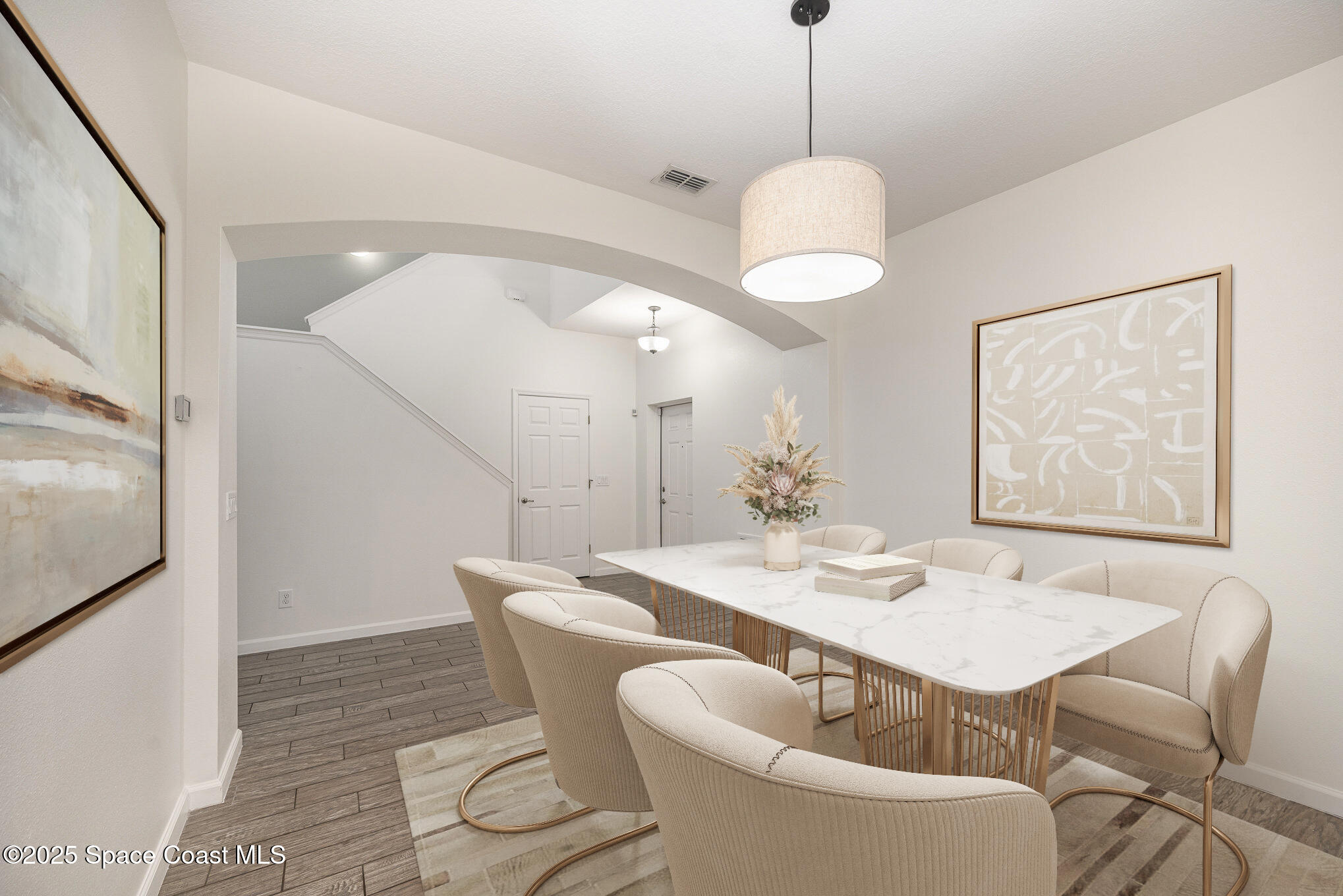3226 Arden Circle Melbourne, FL 32934 - Photo 6 of 43 a dining room with furniture and window