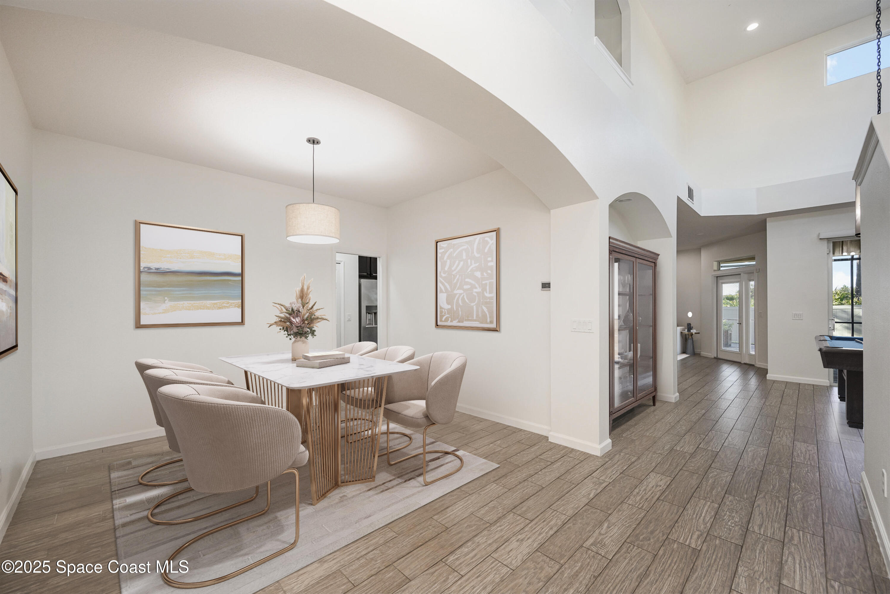 3226 Arden Circle Melbourne, FL 32934 - Photo 7 of 43 a view of a dining room with furniture and wooden floor