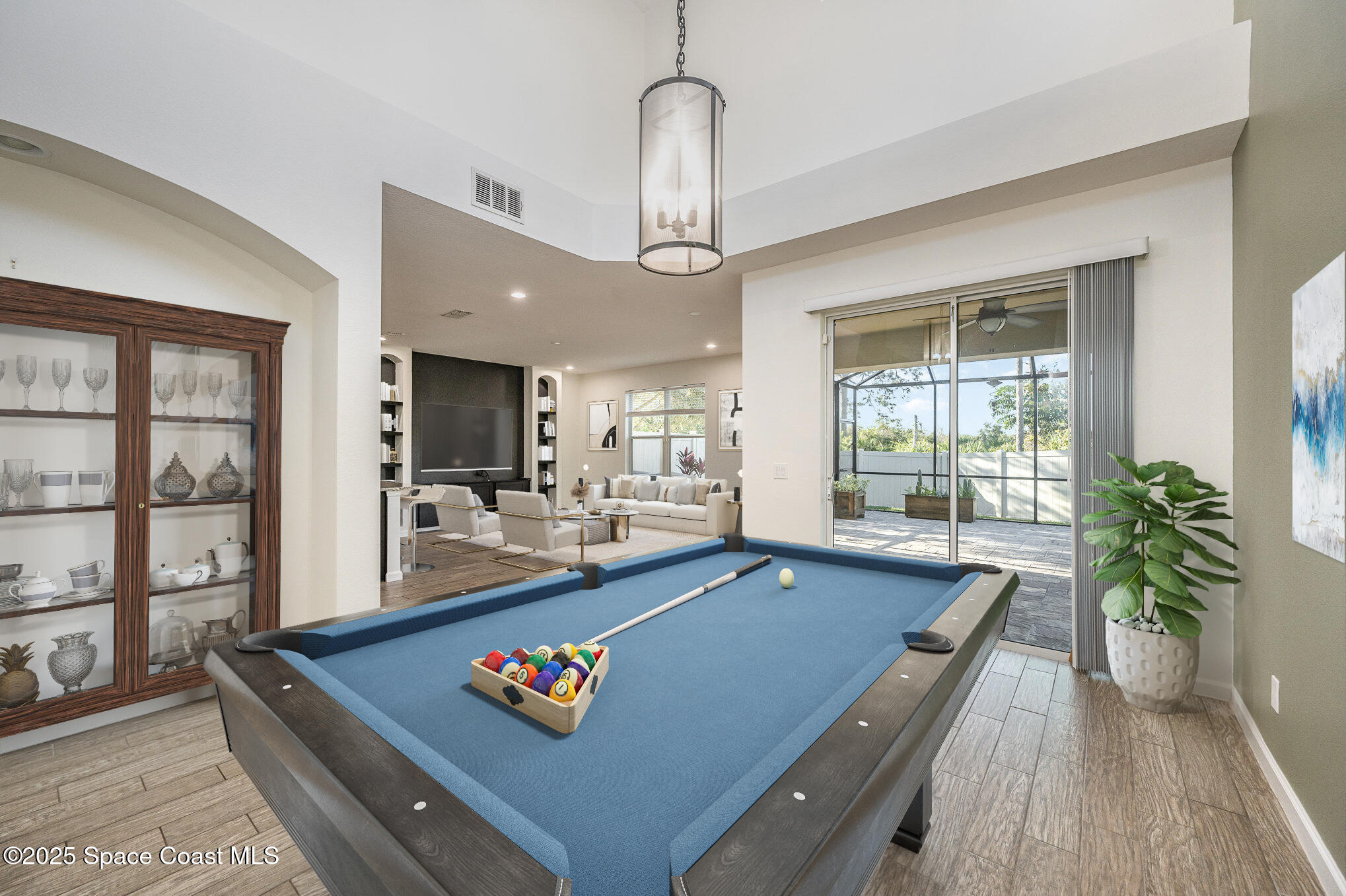3226 Arden Circle Melbourne, FL 32934 - Photo 8 of 43 a living room with furniture and a large window