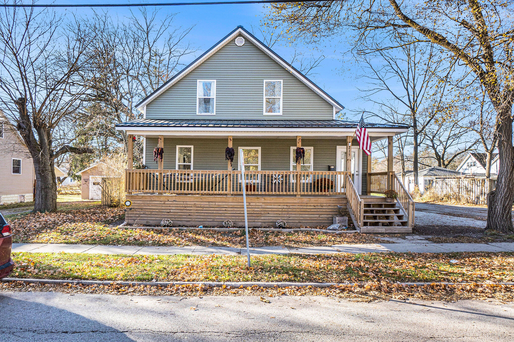 215 South Division Avenue Fremont, MI 49412 - Photo 2 of 31 METAL ROOF! Bring on April Showers!