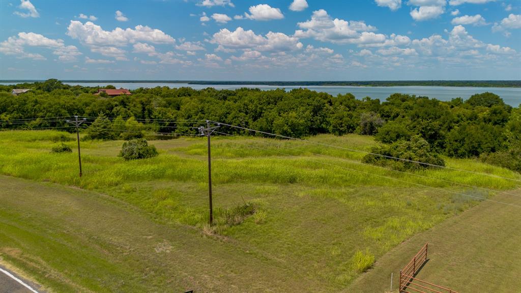 709 N Dawson, TX 76639 - Photo 9 of 10 a view of a big yard with an outdoor space