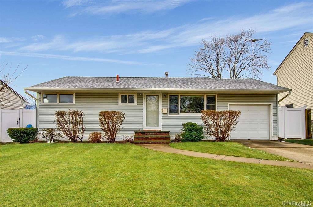 15 Janet Drive Plainview, NY 11803 - Photo 1 of 23 a front view of a house with garden
