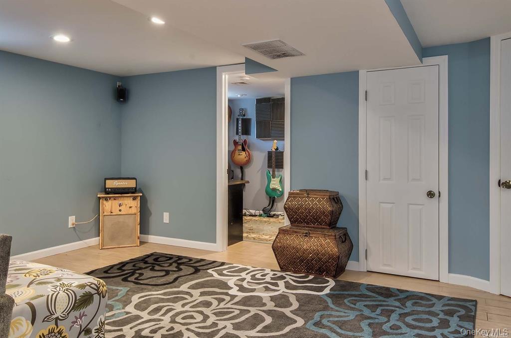 15 Janet Drive Plainview, NY 11803 - Photo 14 of 23 a bedroom with furniture and a window