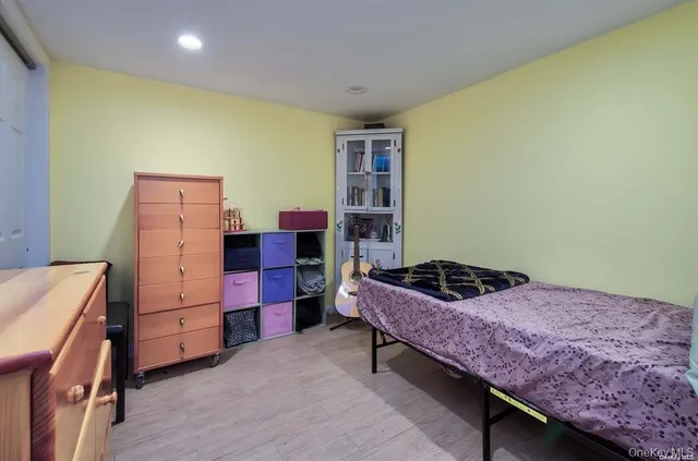 a bedroom with a bed and furniture