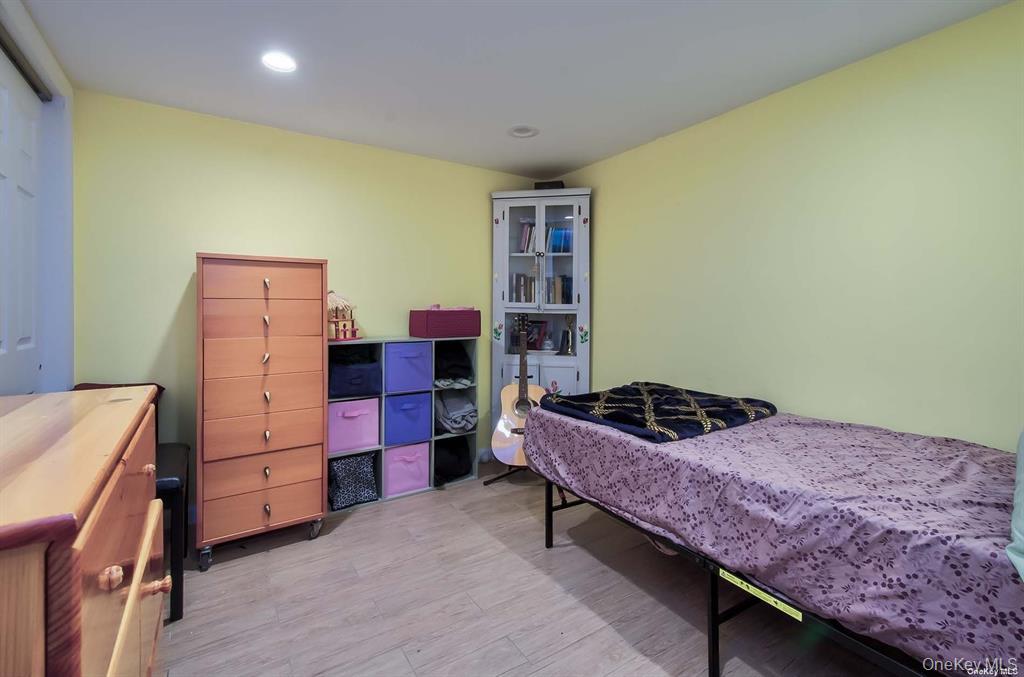 15 Janet Drive Plainview, NY 11803 - Photo 18 of 23 a bedroom with a bed and furniture