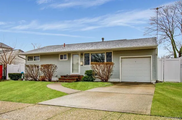 a front view of house with yard