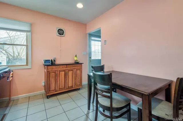 a view of a livingroom with furniture and window