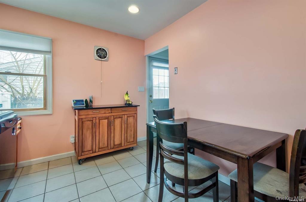 15 Janet Drive Plainview, NY 11803 - Photo 7 of 23 a view of a livingroom with furniture and window