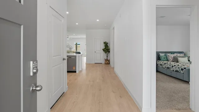 a view of a hallway view with living room