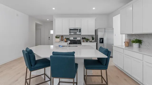 a view of kitchen with breakfast area
