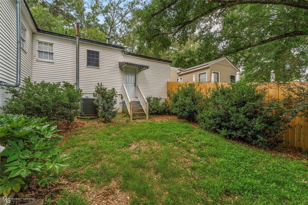 515 Davis Street Minden, LA 71055 - Photo 28 of 28 a front view of house with yard and green space