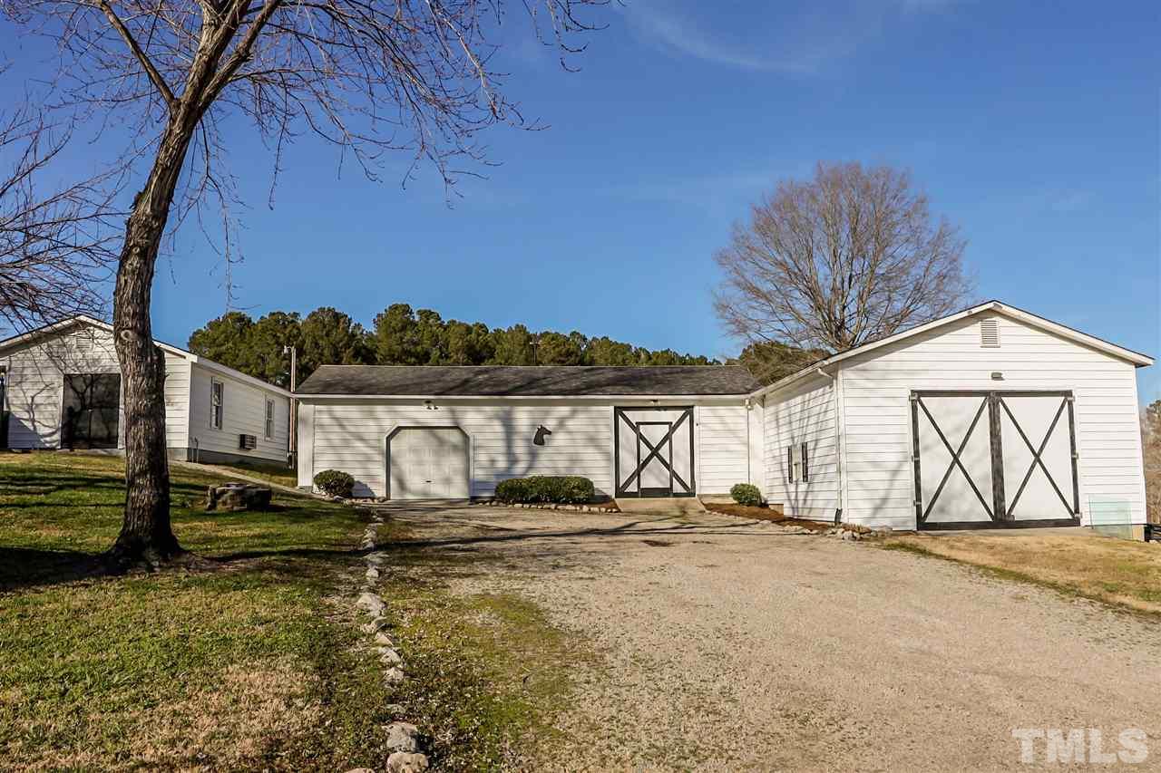 7745 Rock Quarry Road Raleigh, NC 27610 - Photo 22 of 25 Your ideal spot for the "extras". This is the perfect workshop space! Heated & cooled for the time you will spend here.