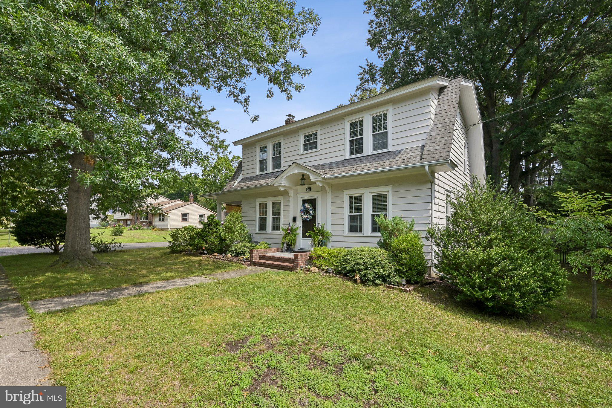 121 Villanova Road Glassboro, NJ 08028 - Photo 2 of 31 a front view of a house with garden