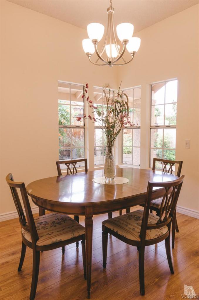 1757 Old Ranch Road Camarillo, CA 93012 - Photo 7 of 39 a view of a dining room with furniture window and wooden floor