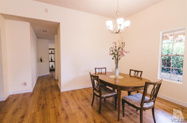 1757 Old Ranch Road Camarillo, CA 93012 - Photo 8 of 39 a view of a dining room with furniture and wooden floor
