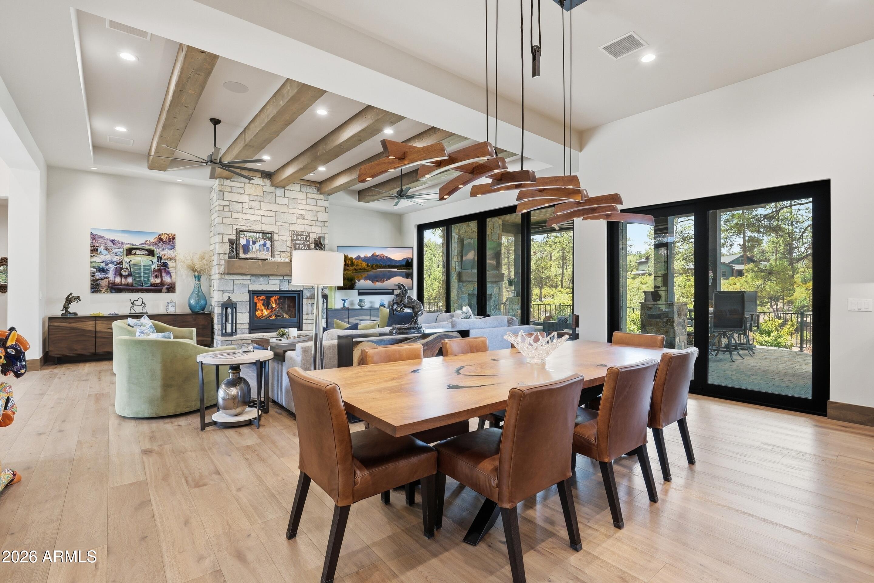 1802 East Senna Point Payson, AZ 85541 - Photo 11 of 60 Designer Table and Custom Hanging Light
