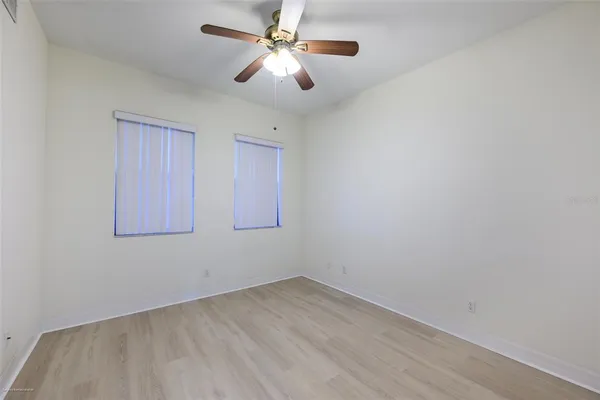 an empty room with a bathroom