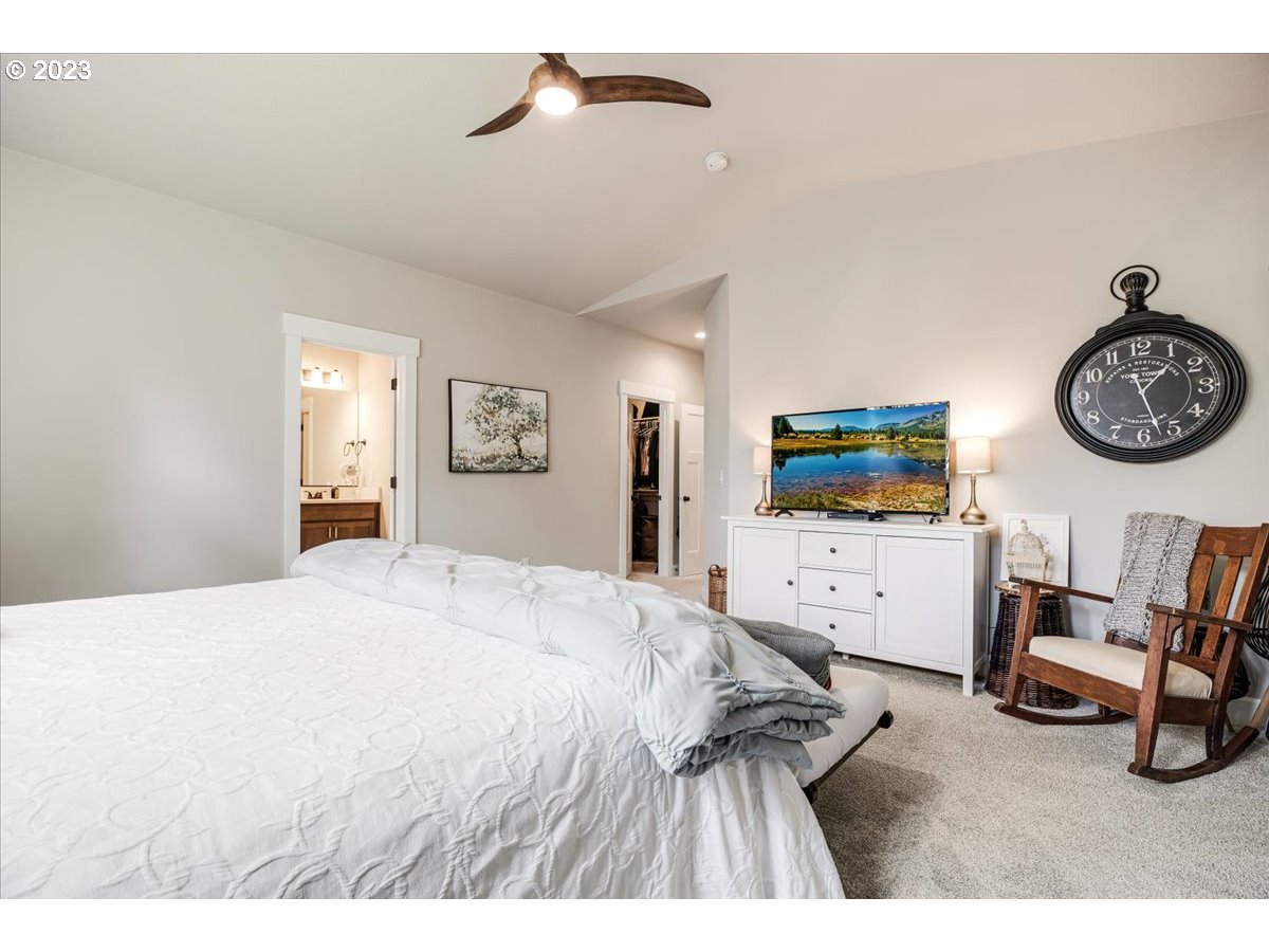 133 Northeast Regan Hill Loop Estacada, OR 97023 - Photo 14 of 29 a view of living room with furniture and flat screen tv