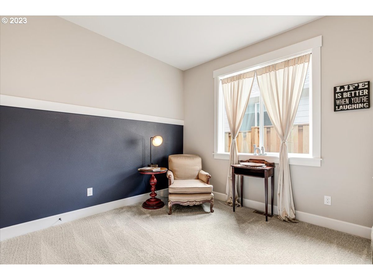133 Northeast Regan Hill Loop Estacada, OR 97023 - Photo 18 of 29 a bedroom with a bed and a large window