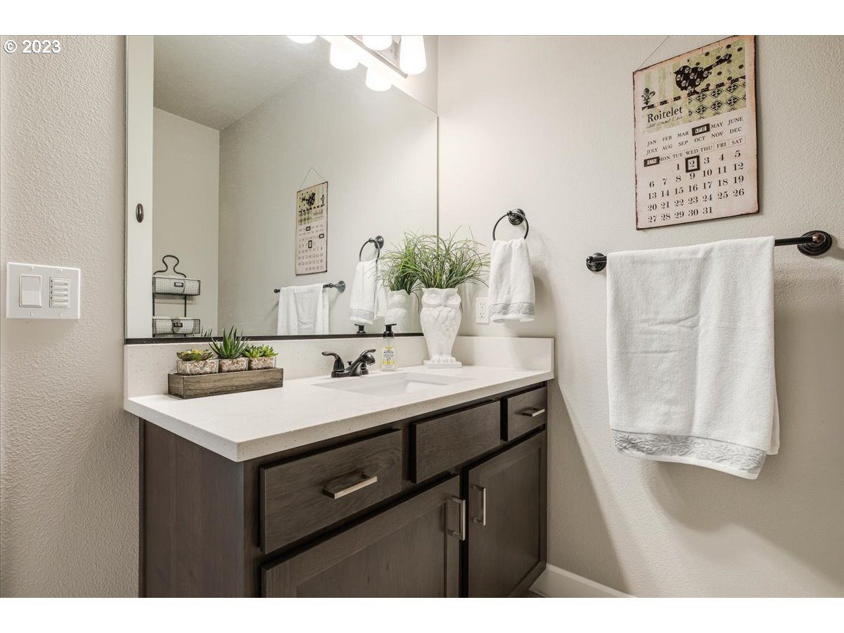 133 Northeast Regan Hill Loop Estacada, OR 97023 - Photo 21 of 29 a bathroom with a sink and a mirror