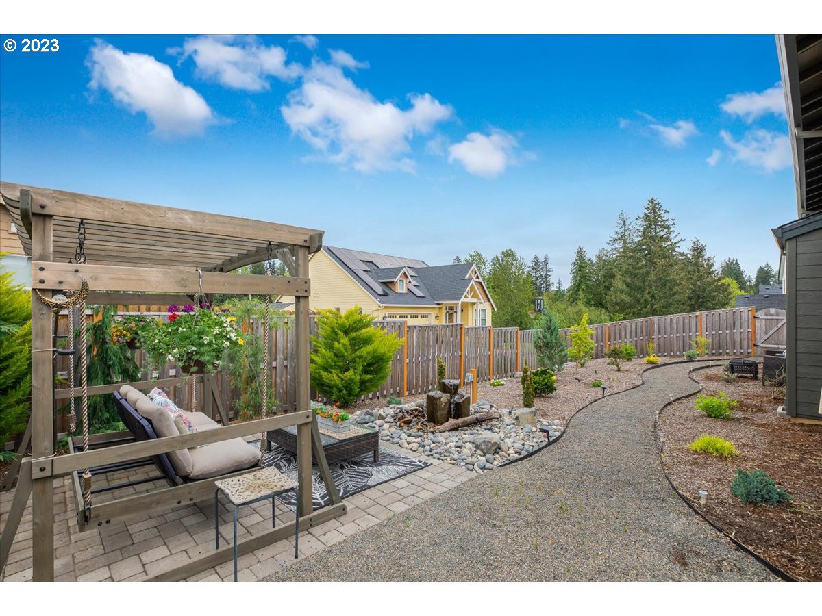 133 Northeast Regan Hill Loop Estacada, OR 97023 - Photo 26 of 29 a view of swimming pool with outdoor seating and a patio