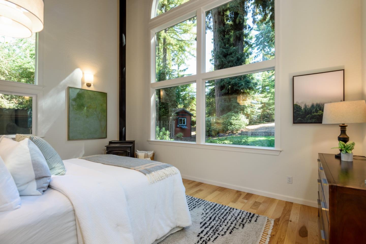 8 Big Tree Way Woodside, CA 94062 - Photo 12 of 31 a bed sitting in a bedroom next to a window