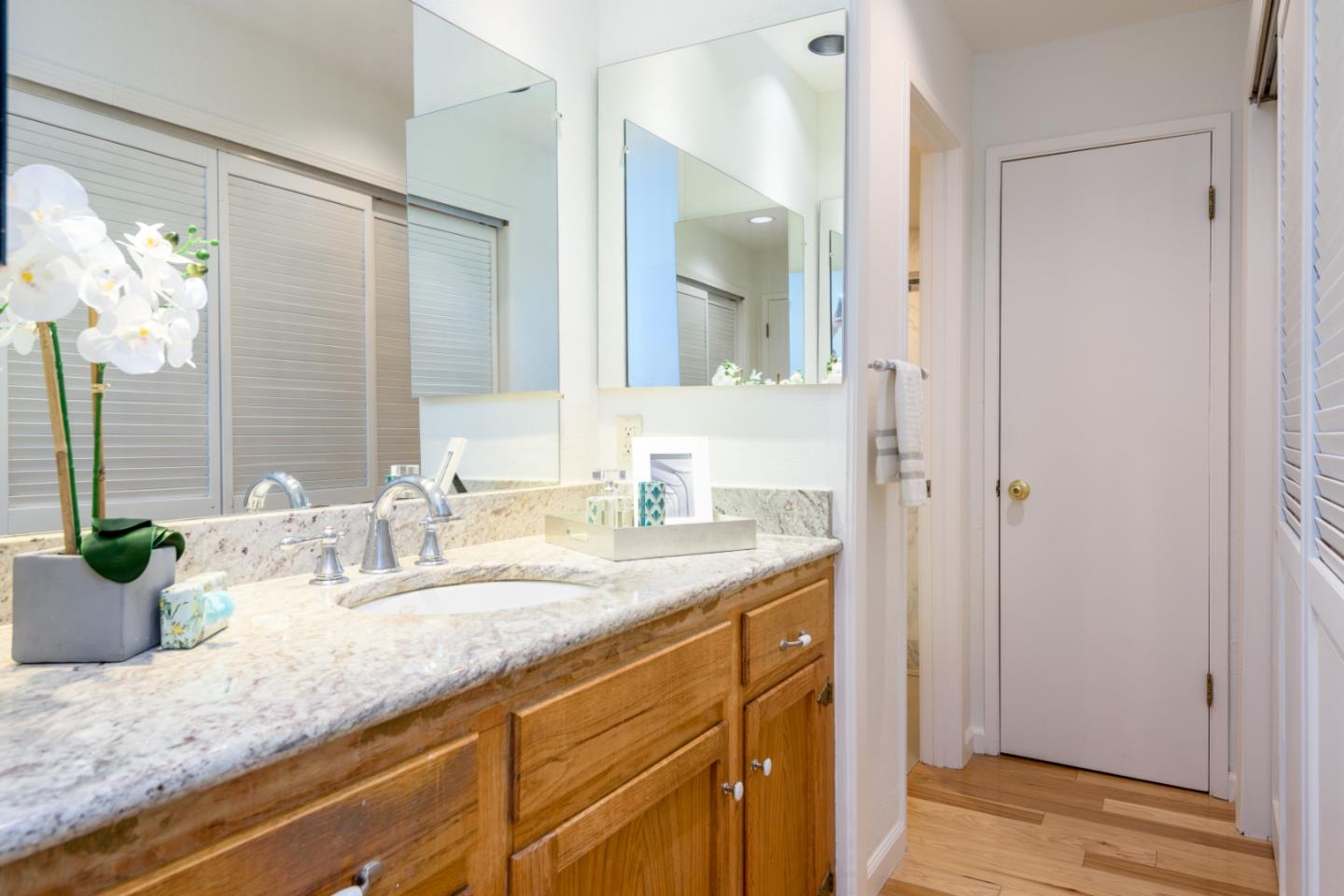8 Big Tree Way Woodside, CA 94062 - Photo 13 of 31 a bathroom with a granite countertop sink and a mirror