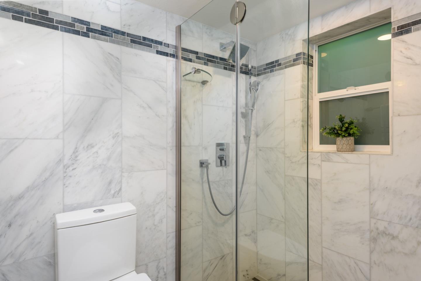 8 Big Tree Way Woodside, CA 94062 - Photo 14 of 31 a bathroom with a shower and toilet