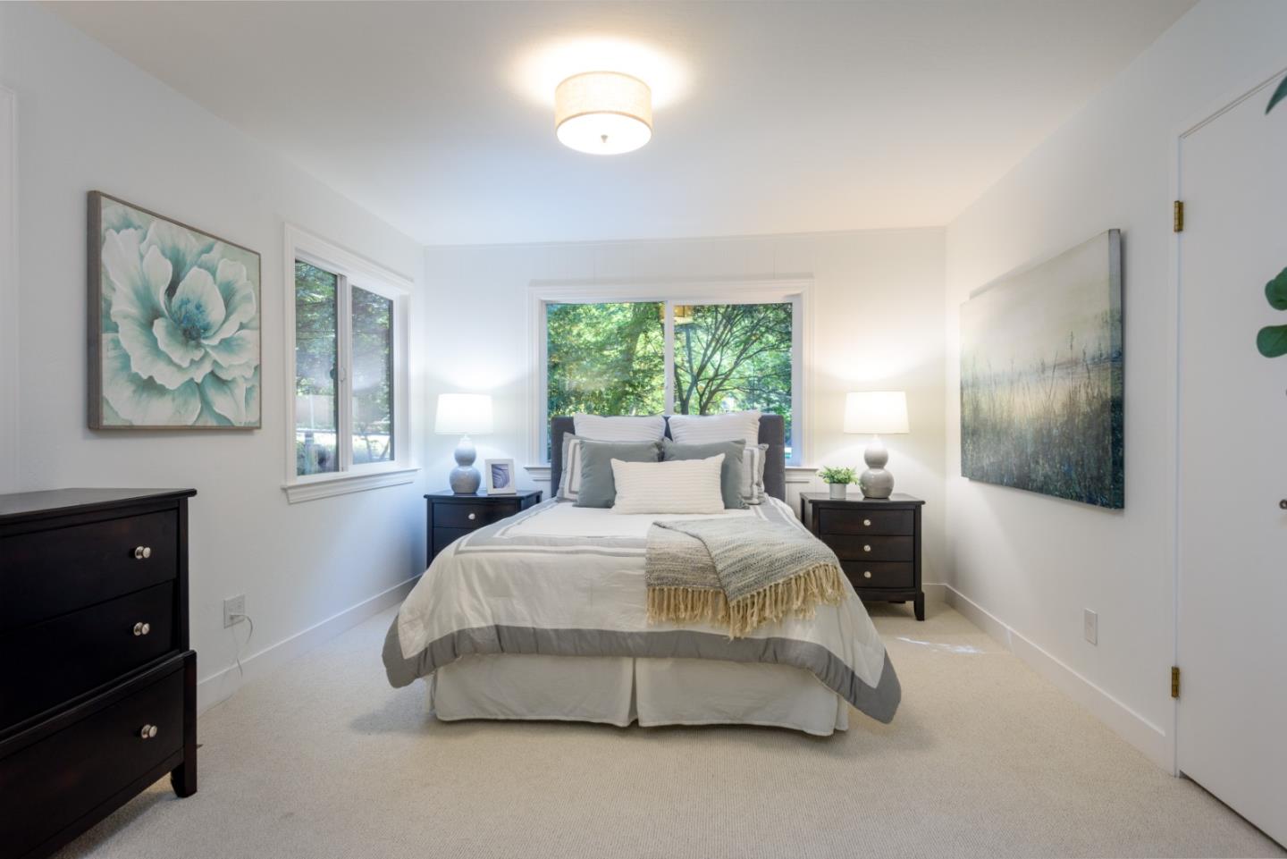 8 Big Tree Way Woodside, CA 94062 - Photo 16 of 31 a bedroom with a bed and window