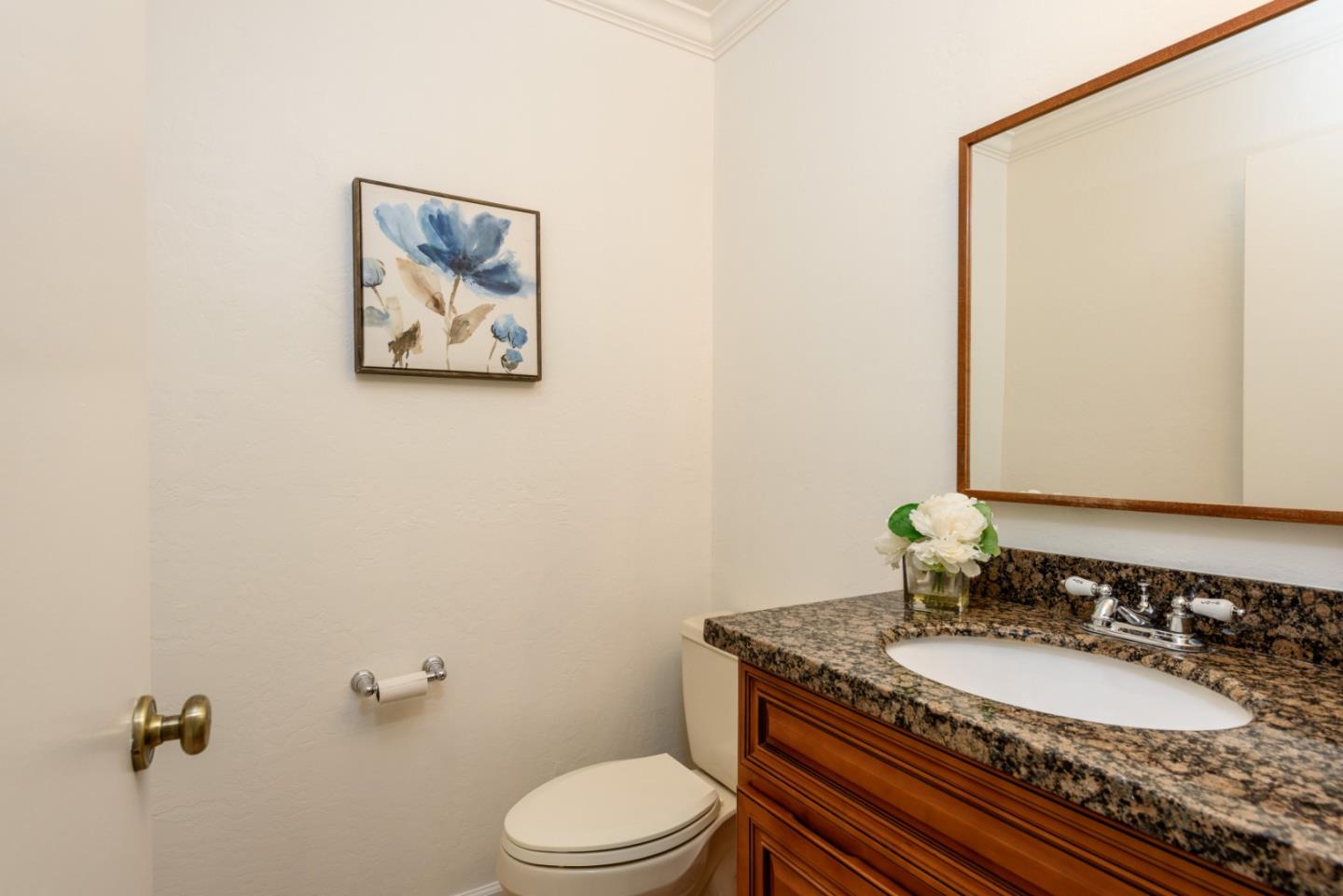 8 Big Tree Way Woodside, CA 94062 - Photo 20 of 31 a bathroom with a granite countertop sink mirror vanity and toilet