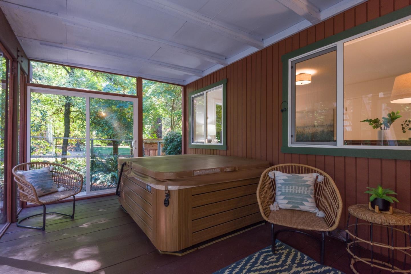8 Big Tree Way Woodside, CA 94062 - Photo 21 of 31 a living room with furniture and a potted plant