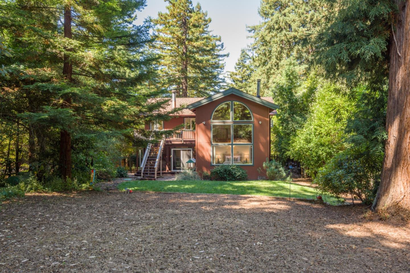 8 Big Tree Way Woodside, CA 94062 - Photo 27 of 31 a front view of a house with a yard